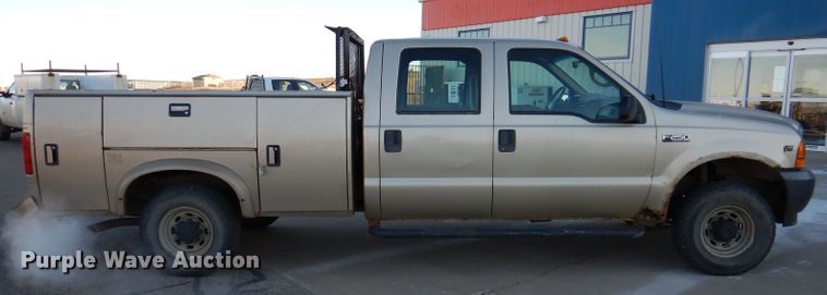 image for item DL5831 2001 Ford F250 Super Duty  Crew Cab utility bed pickup truck