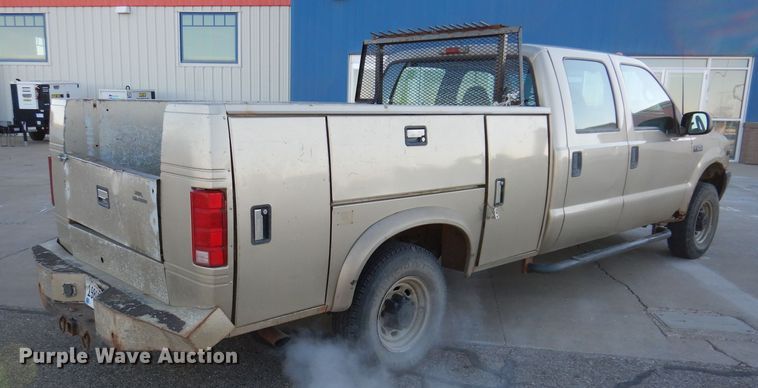 image for item DL5831 2001 Ford F250 Super Duty  Crew Cab utility bed pickup truck