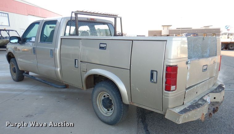 image for item DL5831 2001 Ford F250 Super Duty  Crew Cab utility bed pickup truck