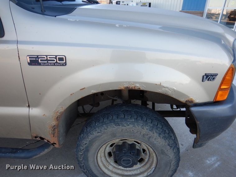 image for item DL5831 2001 Ford F250 Super Duty  Crew Cab utility bed pickup truck