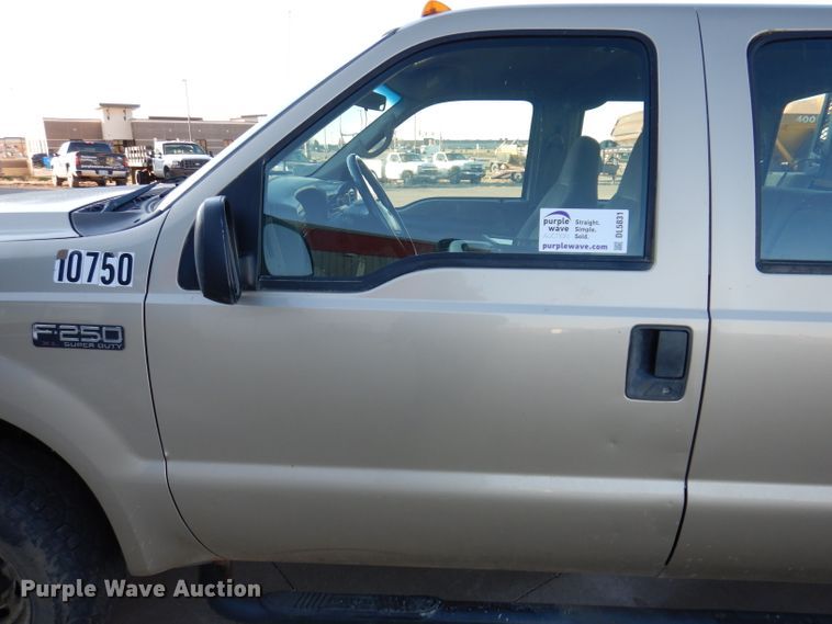 image for item DL5831 2001 Ford F250 Super Duty  Crew Cab utility bed pickup truck