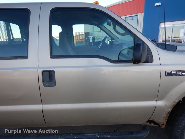 image for item DL5831 2001 Ford F250 Super Duty  Crew Cab utility bed pickup truck