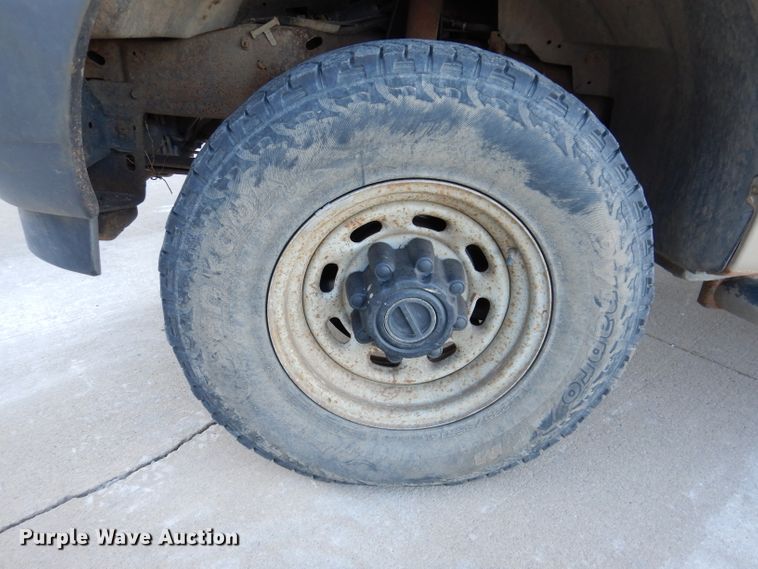 image for item DL5831 2001 Ford F250 Super Duty  Crew Cab utility bed pickup truck