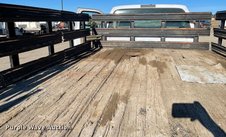 image for item DL5855 2002 Ford F550 Super Duty XL  flatbed truck