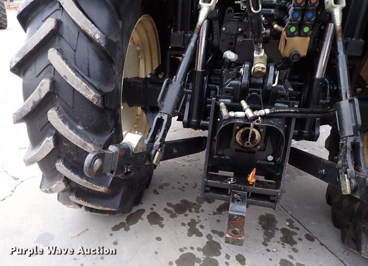 image for item IS9286 New Holland TS115A  MFWD tractor