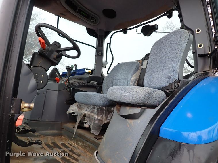 image for item IS9286 New Holland TS115A  MFWD tractor