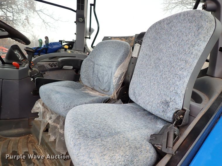 image for item IS9286 New Holland TS115A  MFWD tractor