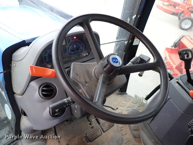 image for item IS9286 New Holland TS115A  MFWD tractor