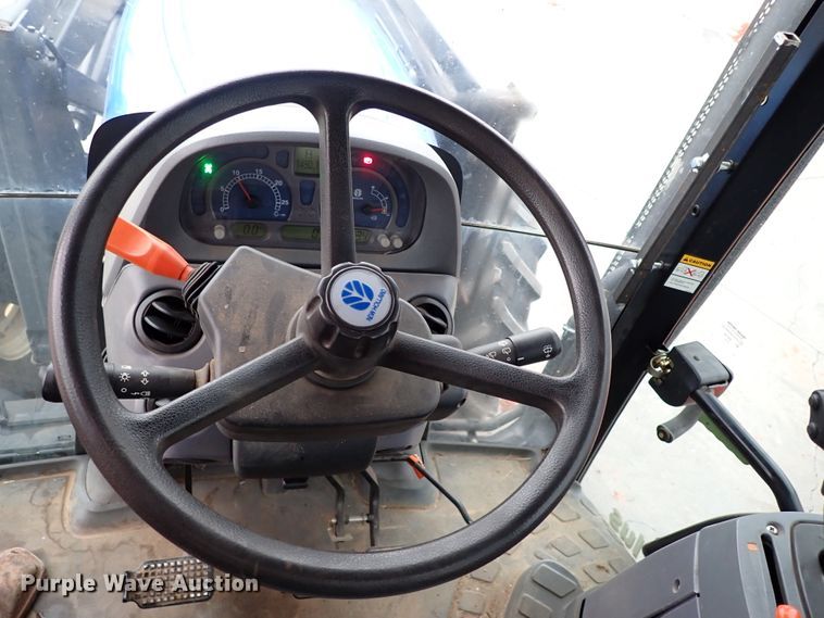 image for item IS9286 New Holland TS115A  MFWD tractor