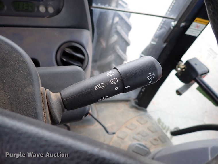 image for item IS9286 New Holland TS115A  MFWD tractor