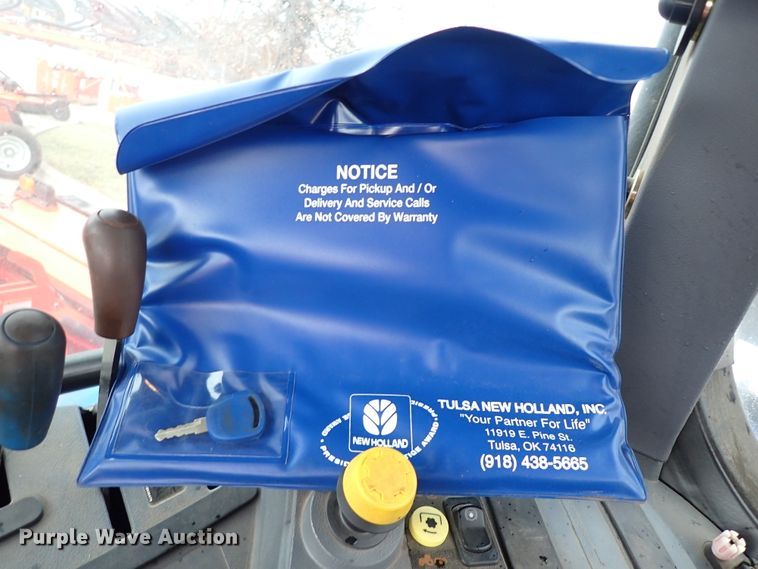 image for item IS9286 New Holland TS115A  MFWD tractor