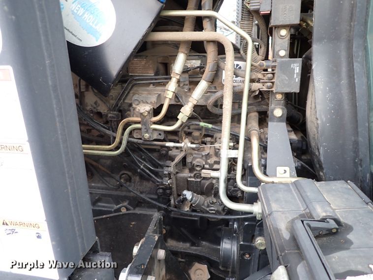 image for item IS9286 New Holland TS115A  MFWD tractor