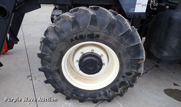 image for item IS9286 New Holland TS115A  MFWD tractor