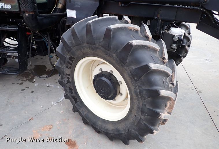 image for item IS9286 New Holland TS115A  MFWD tractor