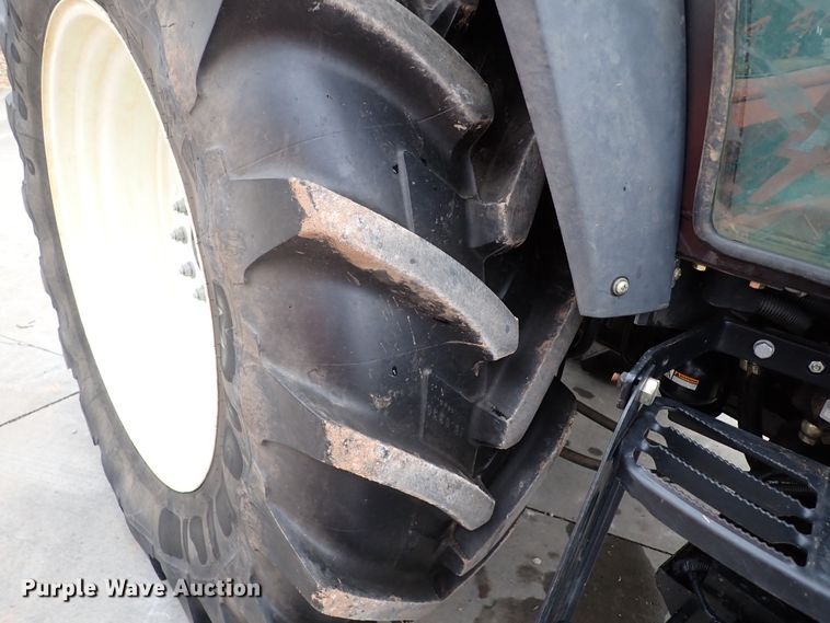 image for item IS9286 New Holland TS115A  MFWD tractor