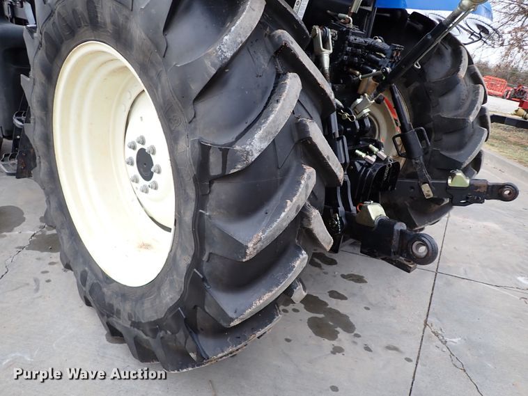 image for item IS9286 New Holland TS115A  MFWD tractor