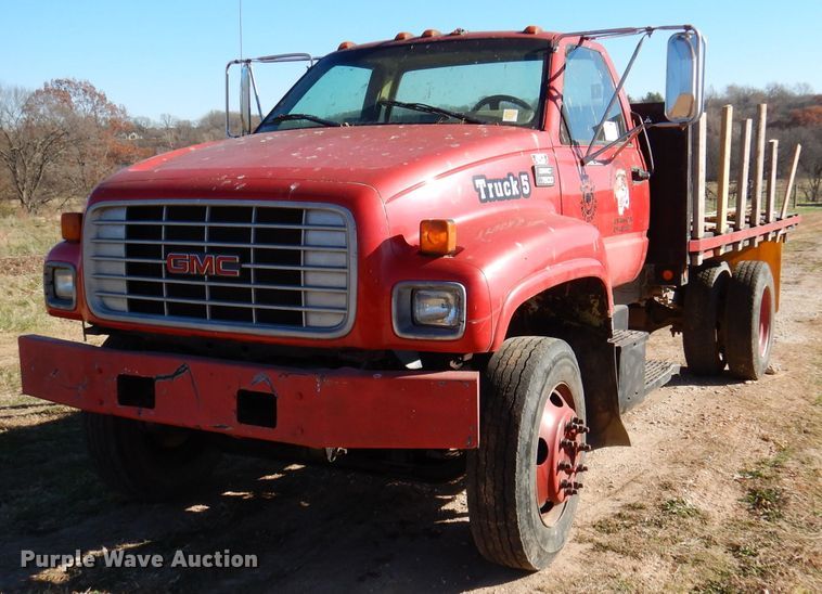 image for item DJ3761 1998 GMC C7500  flatbed truck