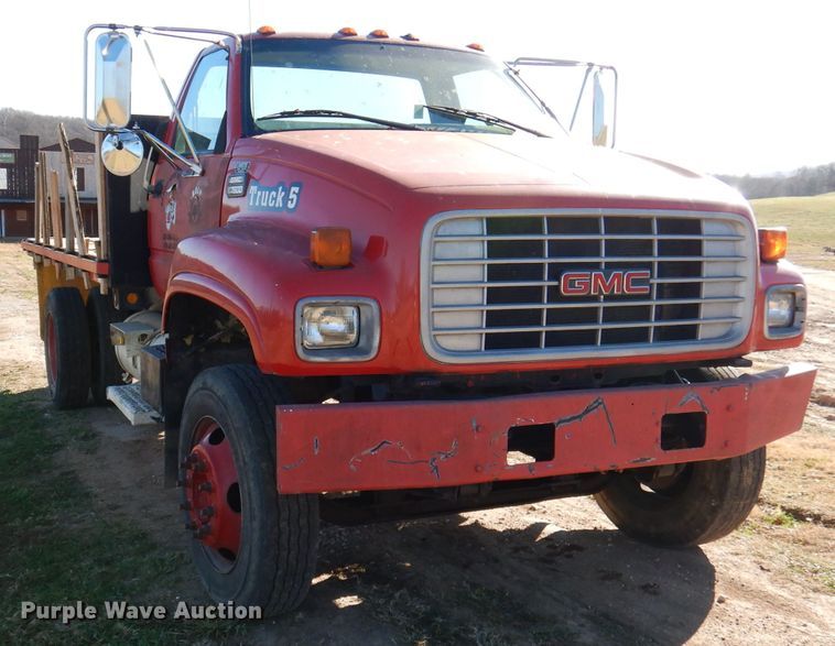 image for item DJ3761 1998 GMC C7500  flatbed truck