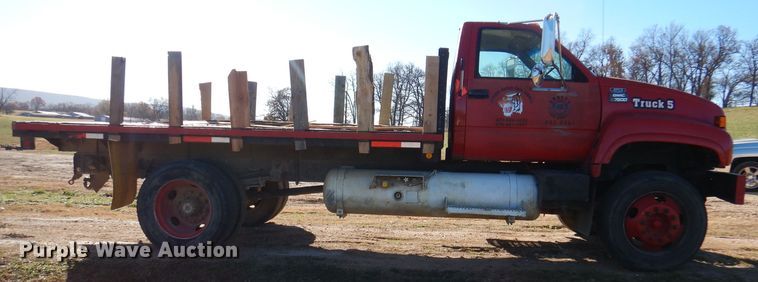 image for item DJ3761 1998 GMC C7500  flatbed truck