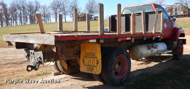 image for item DJ3761 1998 GMC C7500  flatbed truck