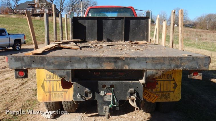 image for item DJ3761 1998 GMC C7500  flatbed truck