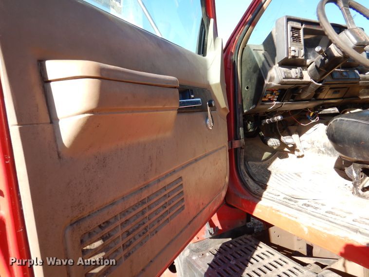 image for item DJ3761 1998 GMC C7500  flatbed truck