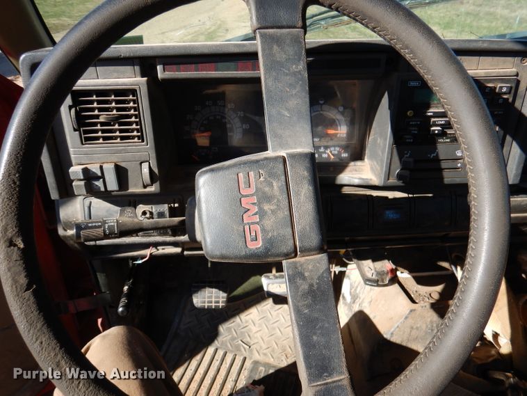 image for item DJ3761 1998 GMC C7500  flatbed truck