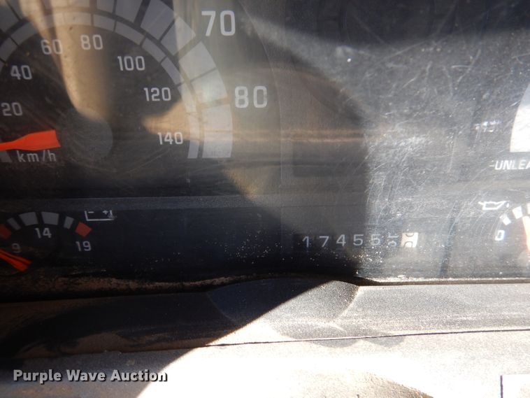 image for item DJ3761 1998 GMC C7500  flatbed truck