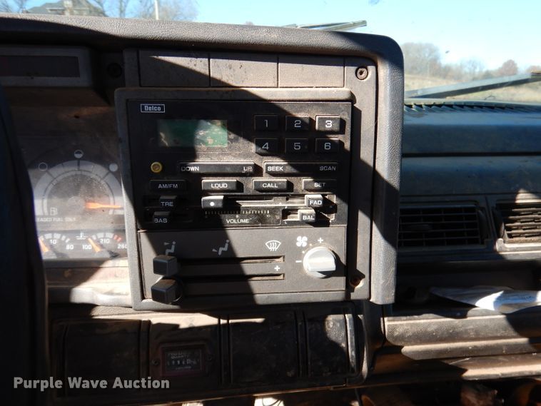 image for item DJ3761 1998 GMC C7500  flatbed truck