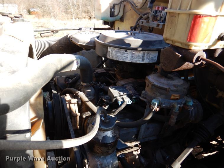 image for item DJ3761 1998 GMC C7500  flatbed truck