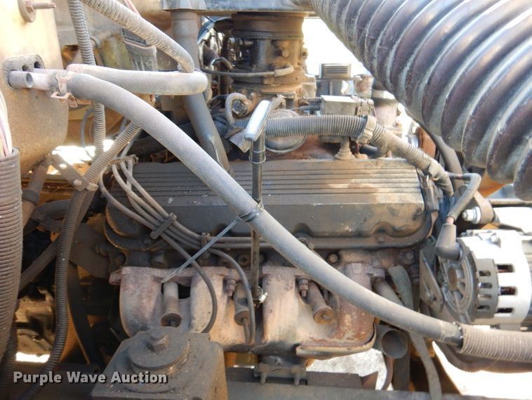 image for item DJ3761 1998 GMC C7500  flatbed truck