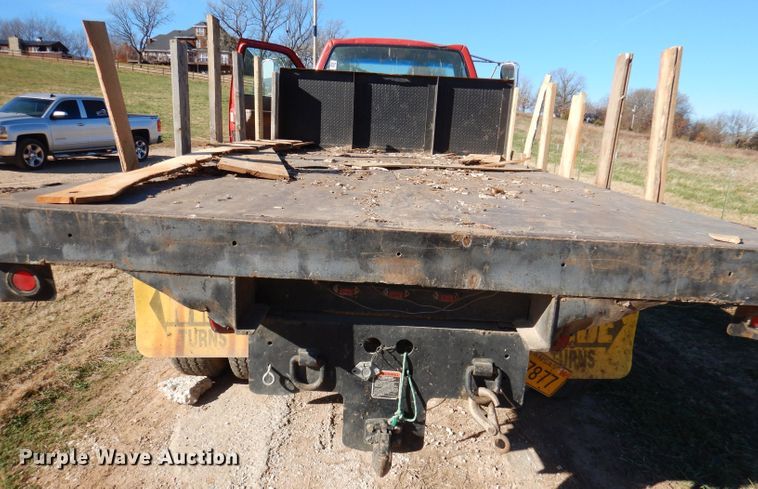 image for item DJ3761 1998 GMC C7500  flatbed truck