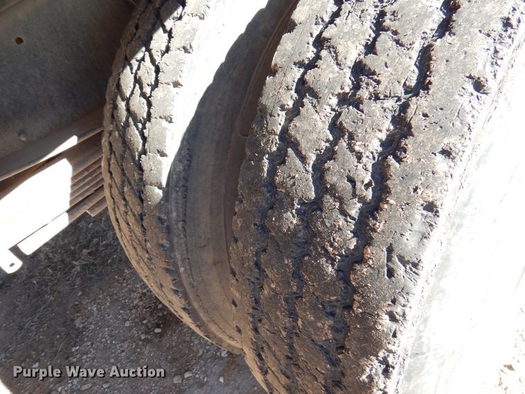 image for item DJ3761 1998 GMC C7500  flatbed truck