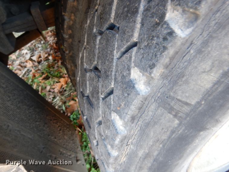 image for item DJ3767 2004 Freightliner M2 106  flatbed truck