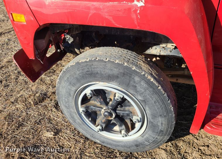 image for item GB9059 1990 Ford F700  utility / service truck