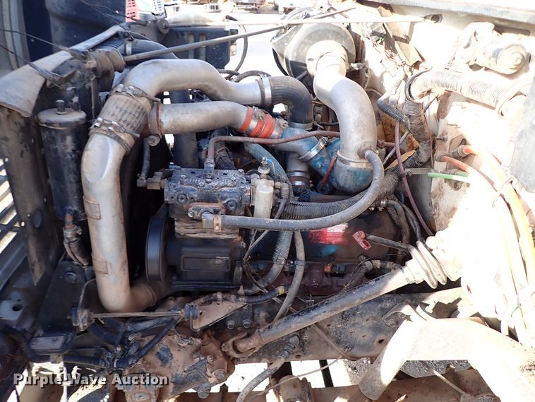 image for item IS9274 2001 International 4700  dump flatbed truck