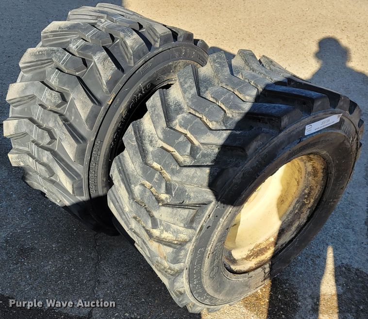 image for item JE9199 (2) 33x15.5-16.5 tires and wheels