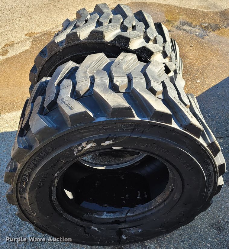 image for item JE9199 (2) 33x15.5-16.5 tires and wheels