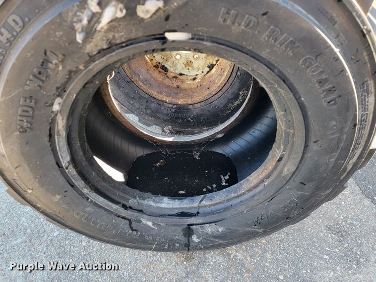 image for item JE9199 (2) 33x15.5-16.5 tires and wheels