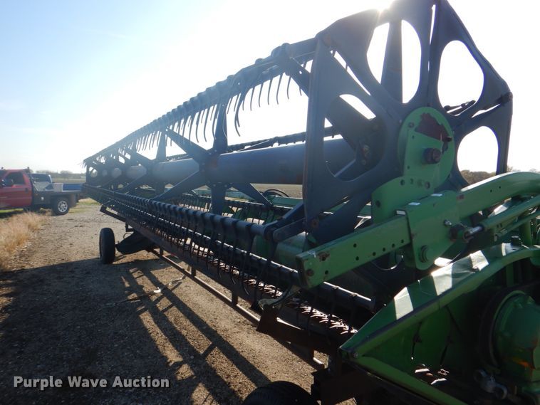 image for item DH7317 1994 John Deere 930  rigid head