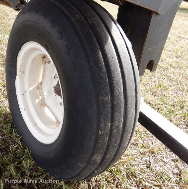 image for item DL3486 2006 MacDon 963  draper head