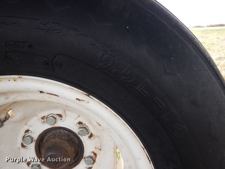 image for item DL3486 2006 MacDon 963  draper head