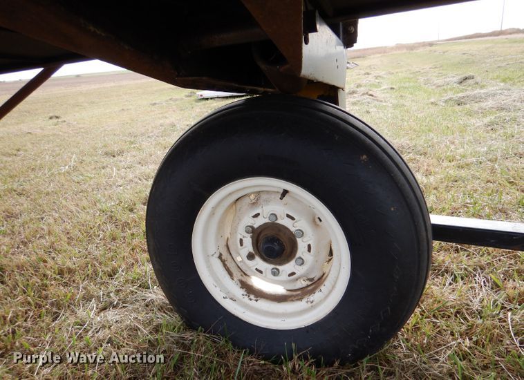 image for item DL3487 2006 MacDon 963  draper head