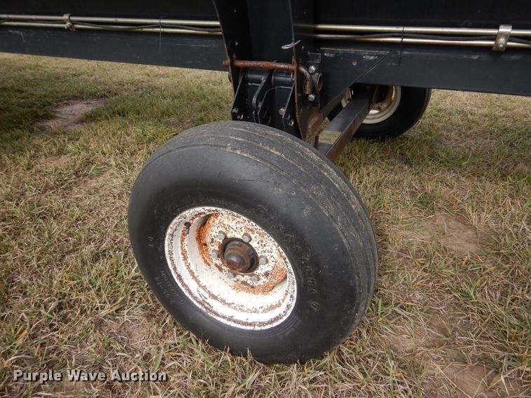 image for item DL3487 2006 MacDon 963  draper head