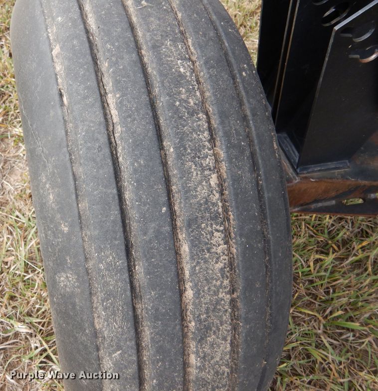 image for item DL3487 2006 MacDon 963  draper head