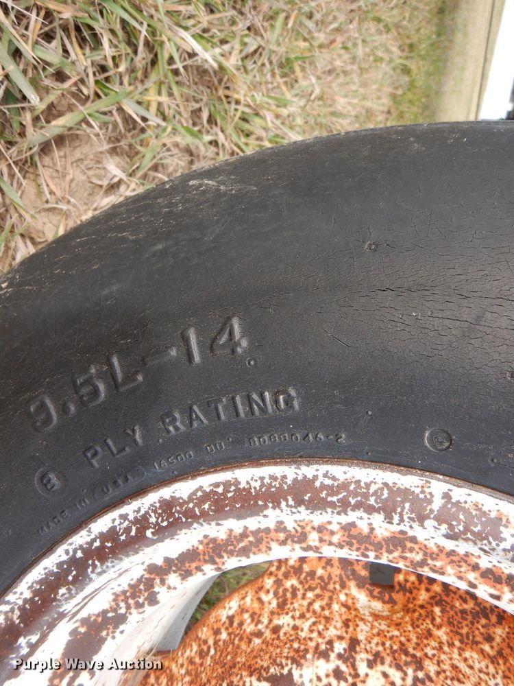 image for item DL3487 2006 MacDon 963  draper head