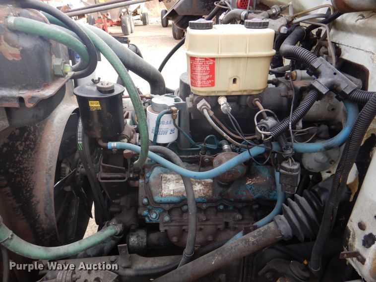 image for item DH8015 1991 International 4600  flatbed truck