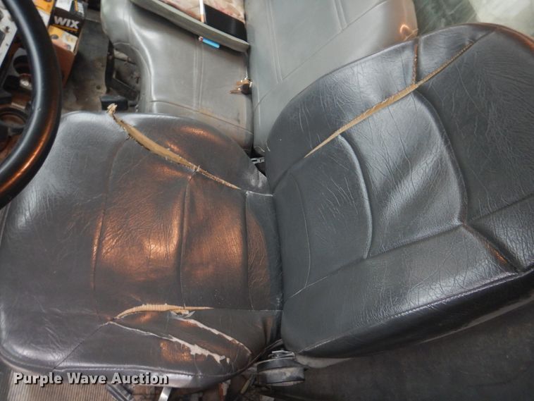 image for item DH8126 2000 Kenworth T300  refuse truck