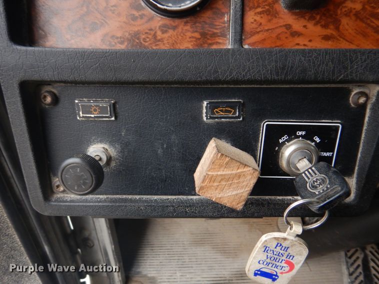 image for item DH8126 2000 Kenworth T300  refuse truck