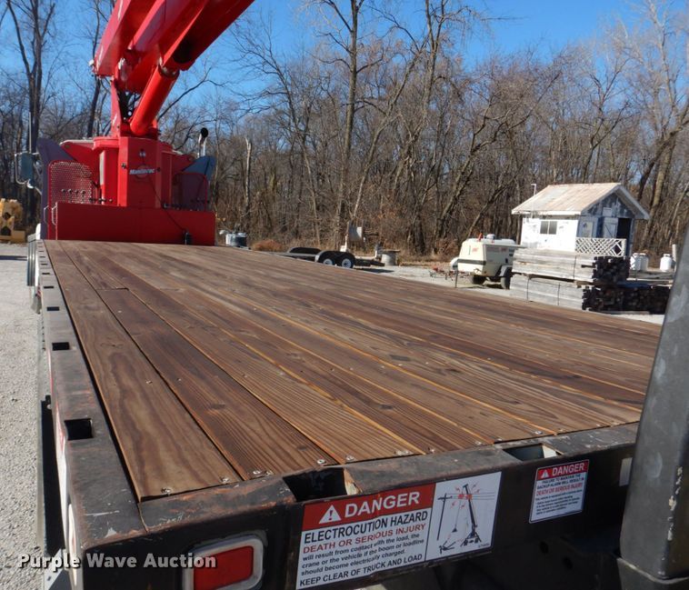 image for item DH8104 2003 Sterling LT7500  crane truck